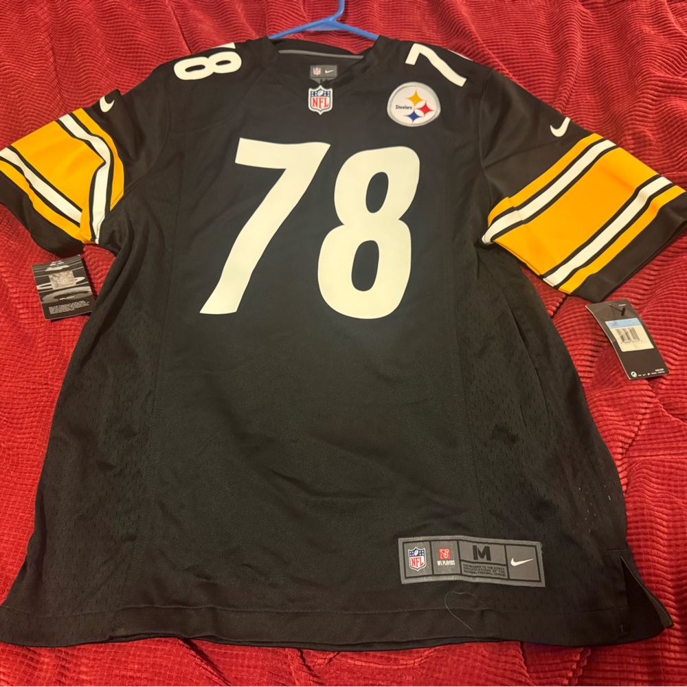 Nike Black and Gold Sports Jersey